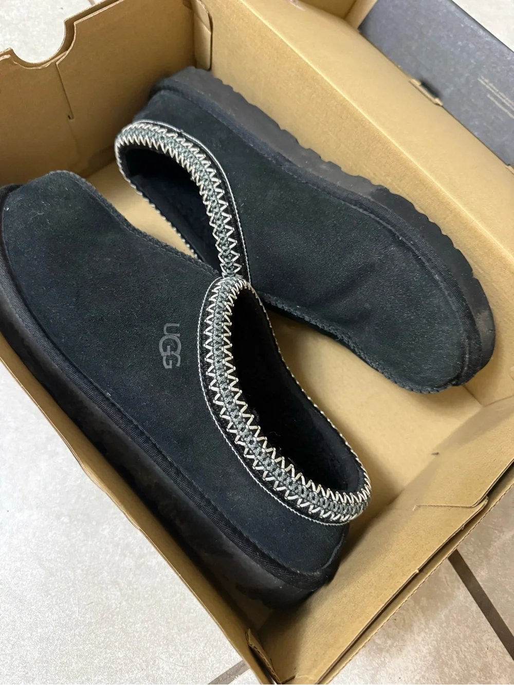 UGG Men's Black Suede Slip-On Moccasin Slippers with Contrast Stitch
